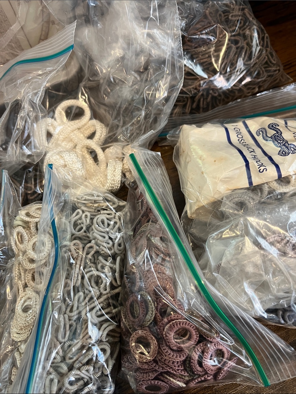 Assorted vintage frog hooks toggles for fabric art.  Large lot #1